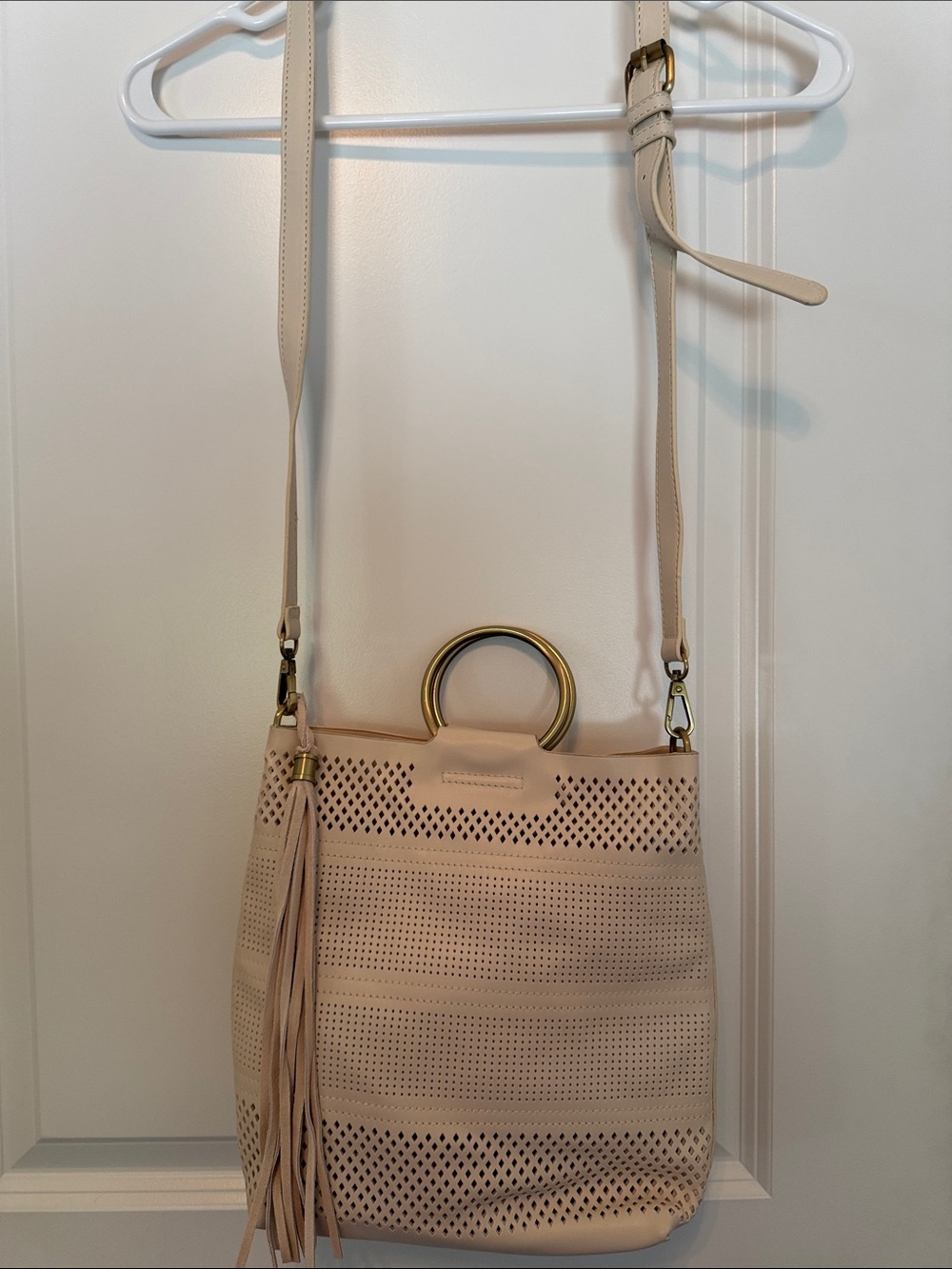 Anthropologie Beige Perforated Leather Crossbody with Tassel & Gold Ring